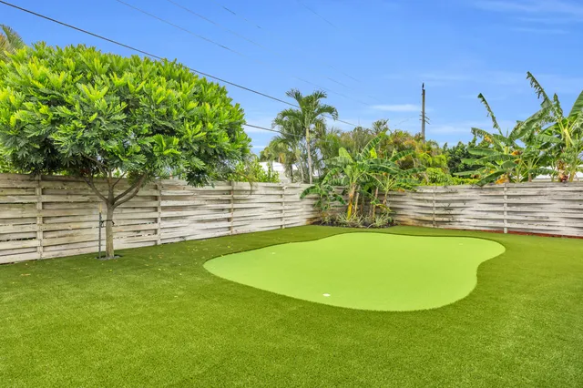 a view of outdoor space yard and swimming pool