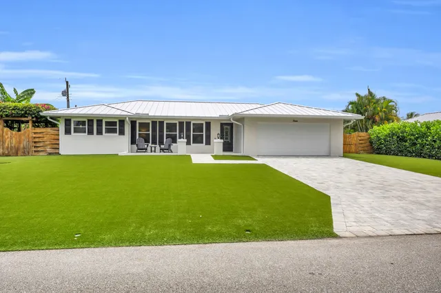 a house view with a garden space