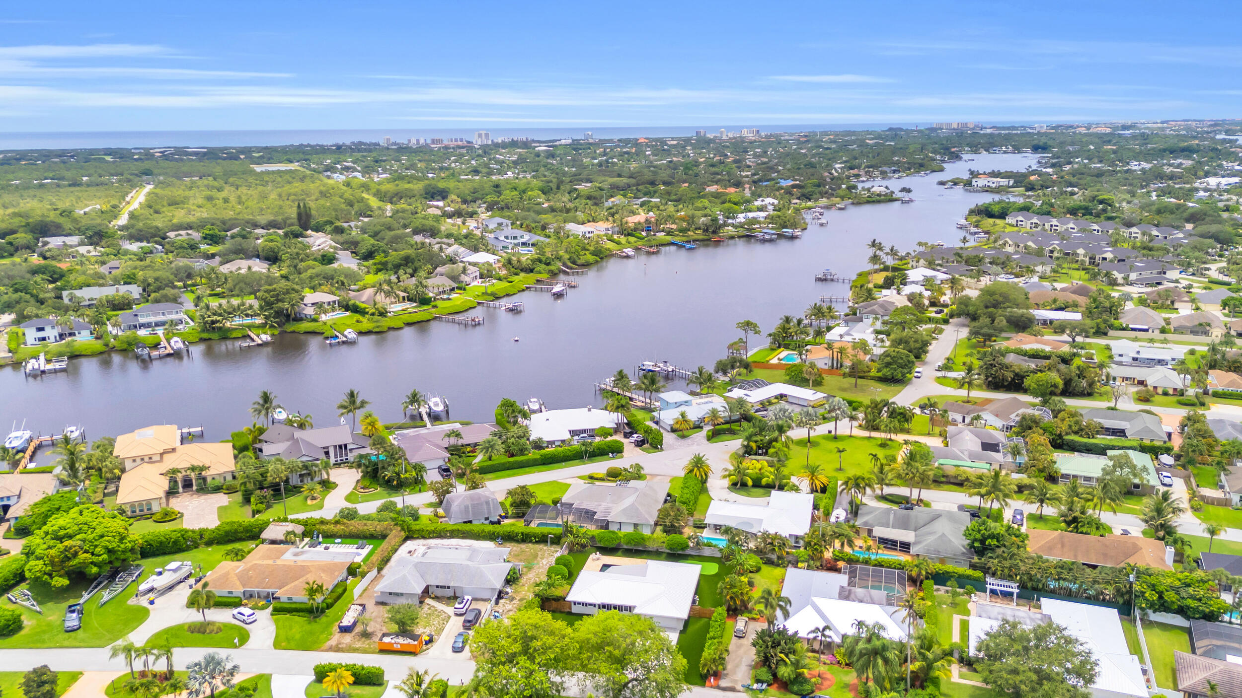 11 Southeast Splitrail Circle Jupiter, FL 33469 - Photo 48 of 48 a view of a lake with a city