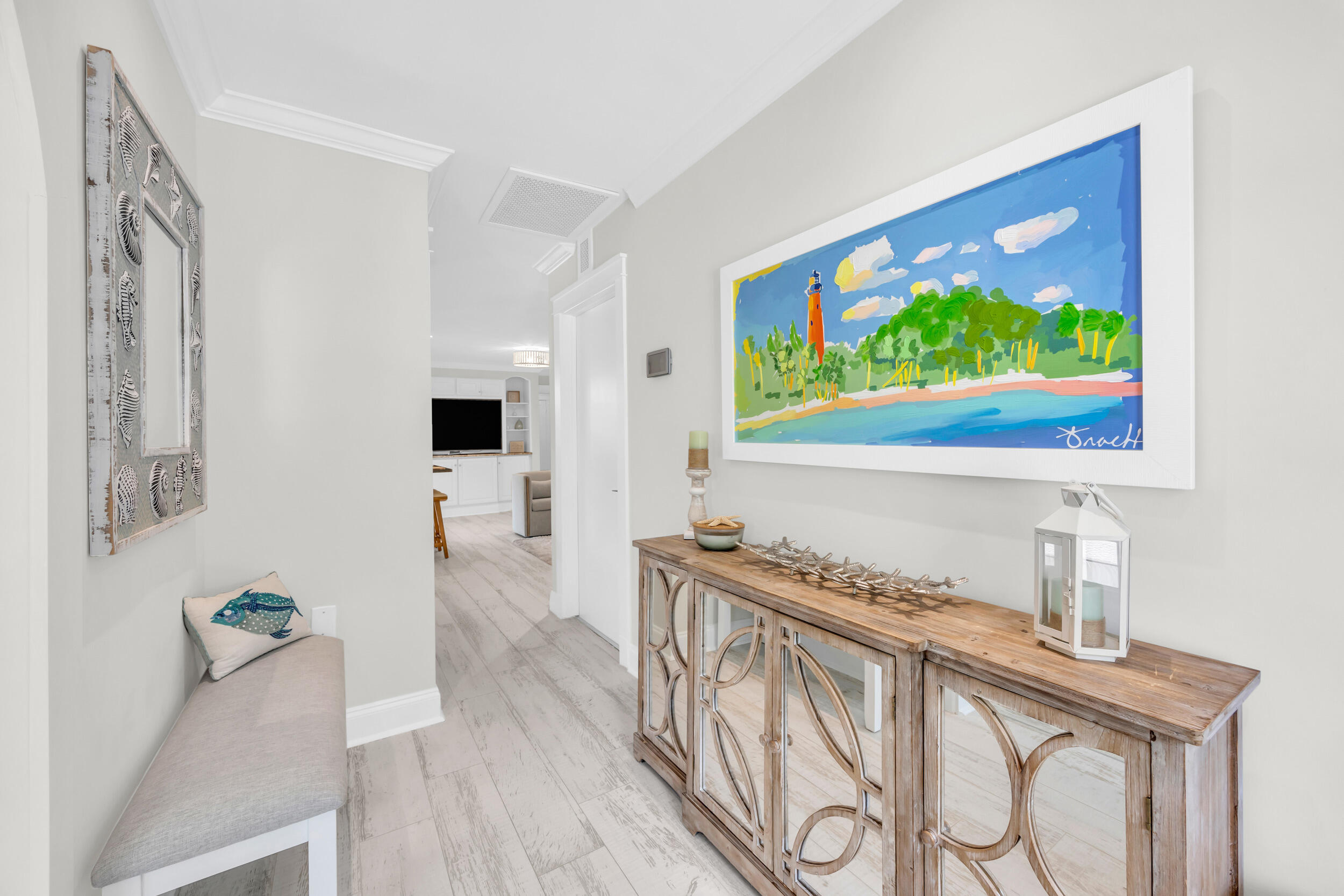 11 Southeast Splitrail Circle Jupiter, FL 33469 - Photo 7 of 48 a kitchen with stainless steel appliances granite countertop a stove a sink and a microwave