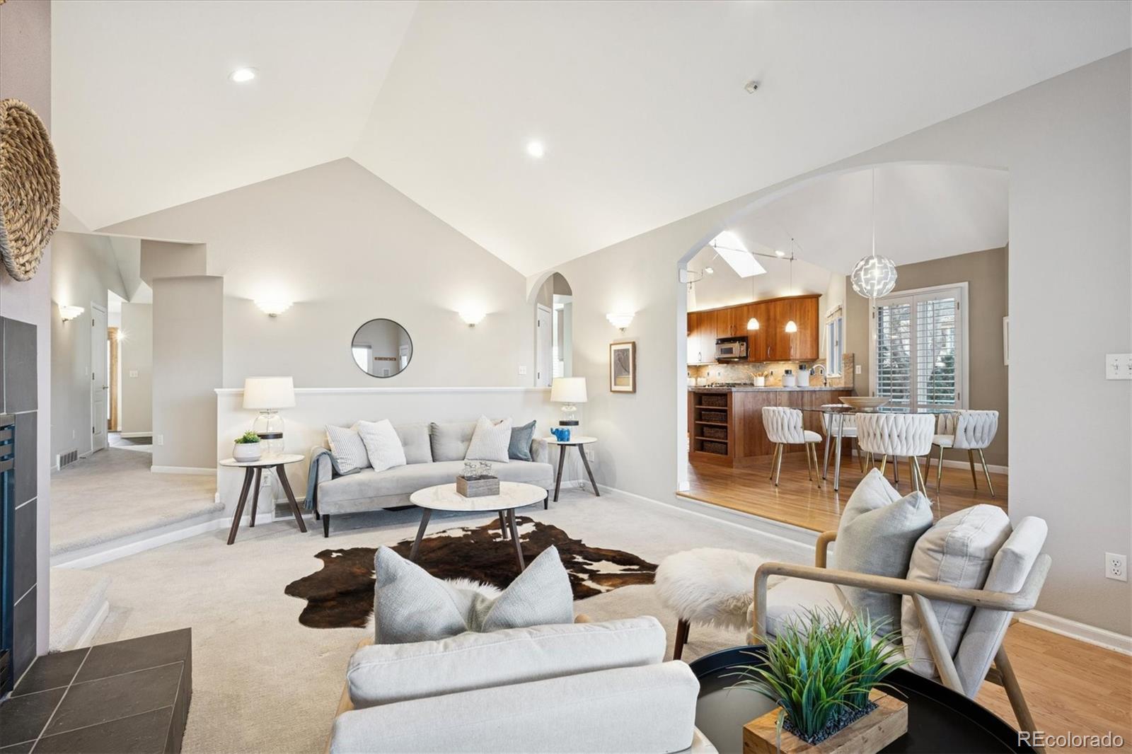 2363 South Adams Street Denver, CO 80210 - Photo 23 of 50 a living room with furniture and a view of kitchen