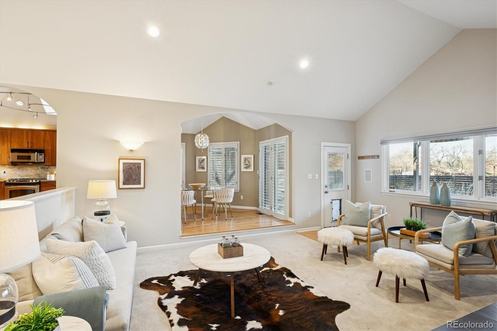 2363 South Adams Street Denver, CO 80210 - Photo 24 of 50 a living room with furniture and a large window