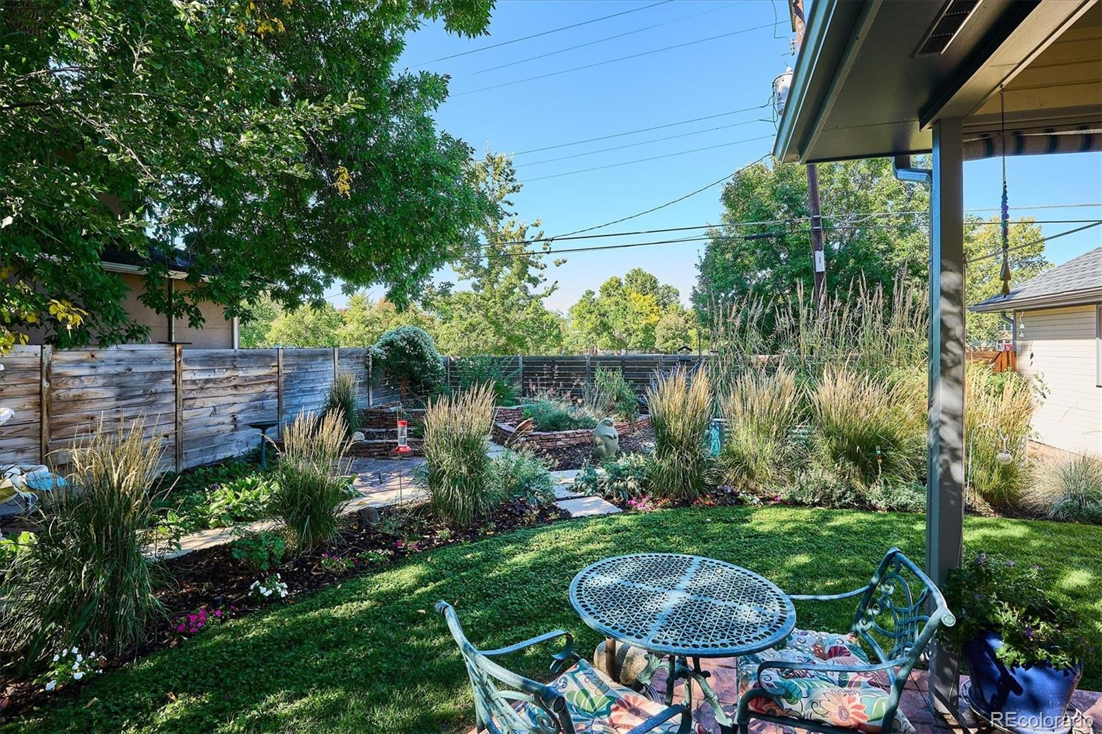 2363 South Adams Street Denver, CO 80210 - Photo 36 of 50 a view of a backyard with plants and a garden