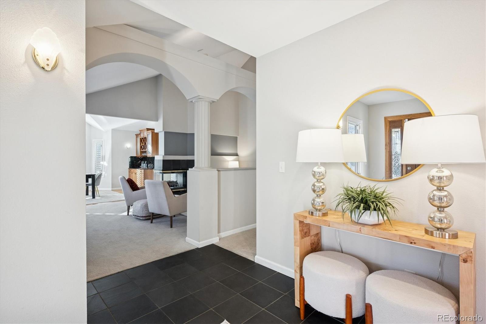 2363 South Adams Street Denver, CO 80210 - Photo 6 of 50 a living room with furniture and a table