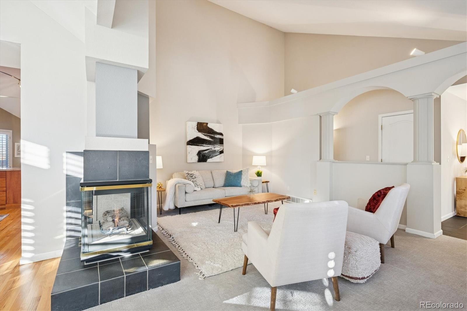 2363 South Adams Street Denver, CO 80210 - Photo 10 of 50 a living room with furniture and wooden floor