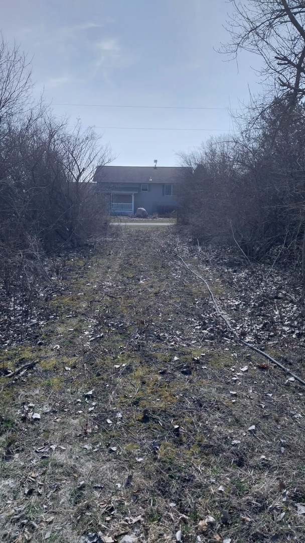 8702 Regnier Road Hebron, IL 60034 - Photo 2 of 2 a view of a yard