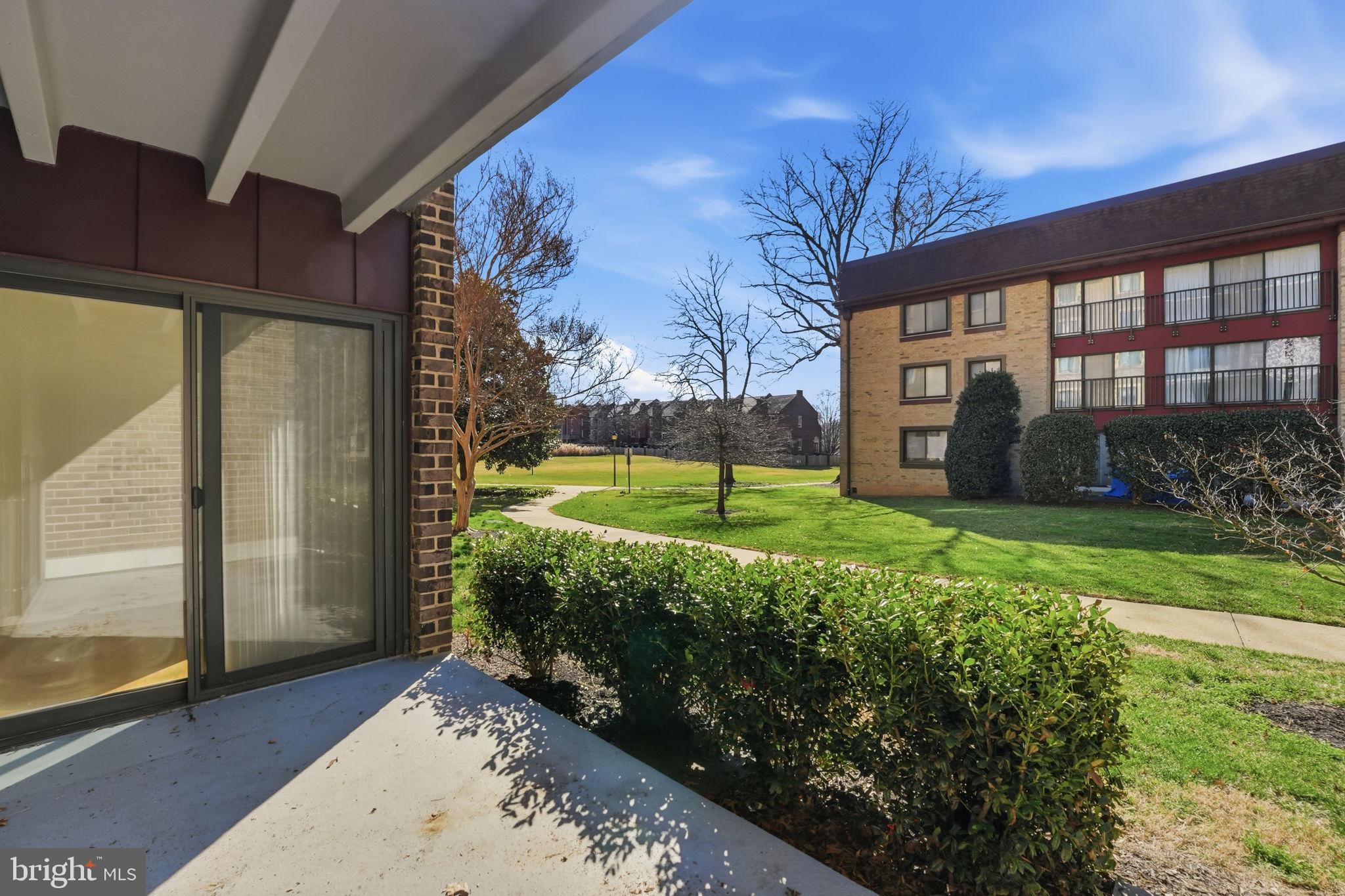 2817 Jermantown Road, Unit 107 Oakton, VA 22124 - Photo 19 of 28 a view of a backyard with garden