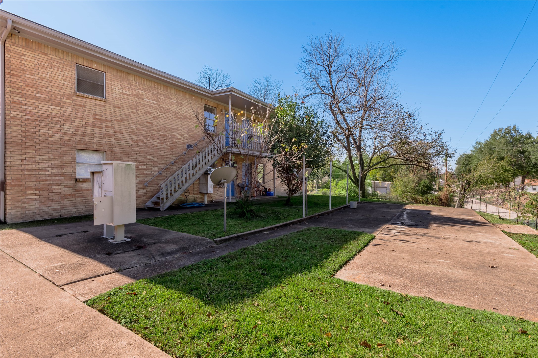 525 12th Street, Unit 7 Huntsville, TX 77340 - Photo 1 of 21 a view of a house with a yard
