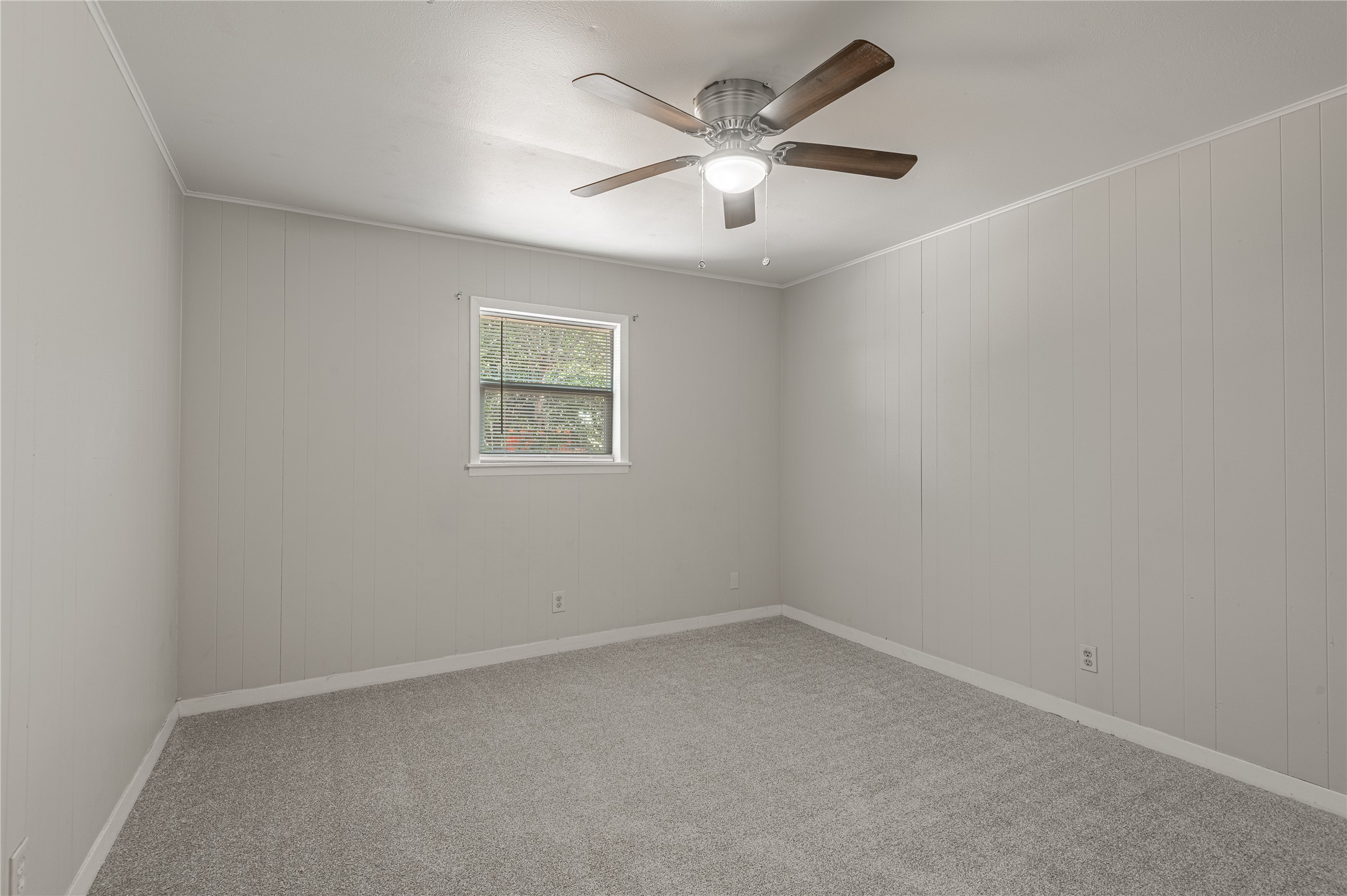 525 12th Street, Unit 7 Huntsville, TX 77340 - Photo 15 of 21 an empty room with a window
