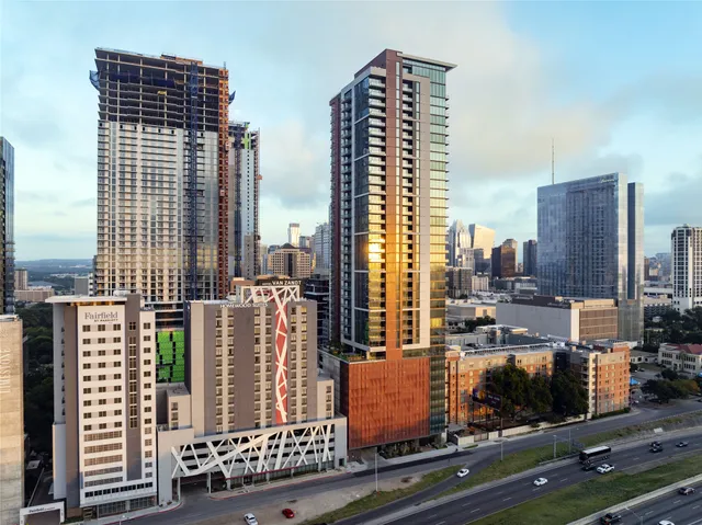a view of buildings with a street