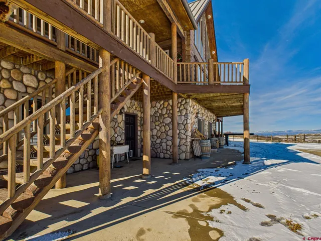 a view of balcony with wooden floor