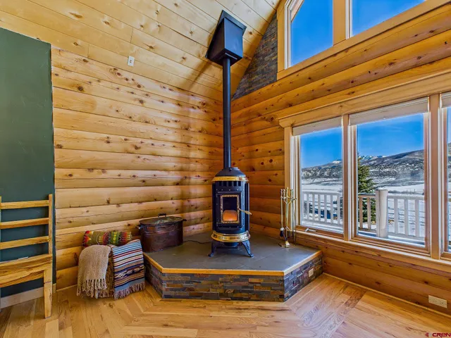 a living room filled with furniture and a rug