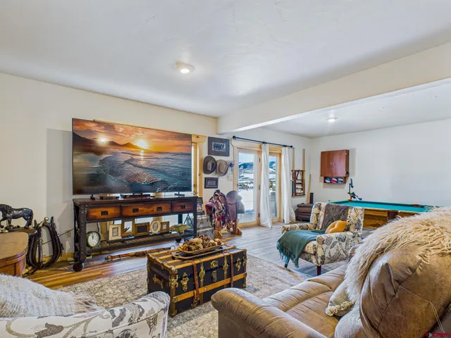 a view of a chairs and table in a patio