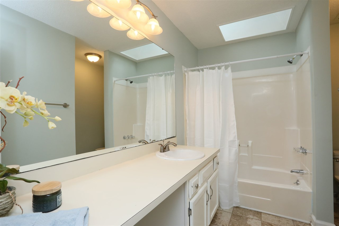 814 Temple Street Raleigh, NC 27609 - Photo 11 of 19 Bright and airy master bath has lots of counter space and a separate toilet area. Master Bath