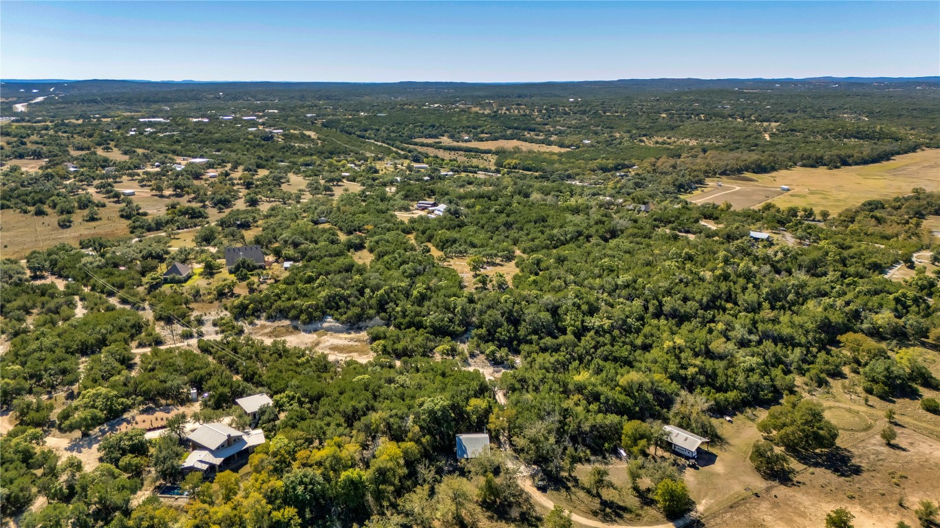 0 Country Lane Dripping Springs, TX 78620 - Photo 6 of 15 an aerial view of residential houses with outdoor space and trees