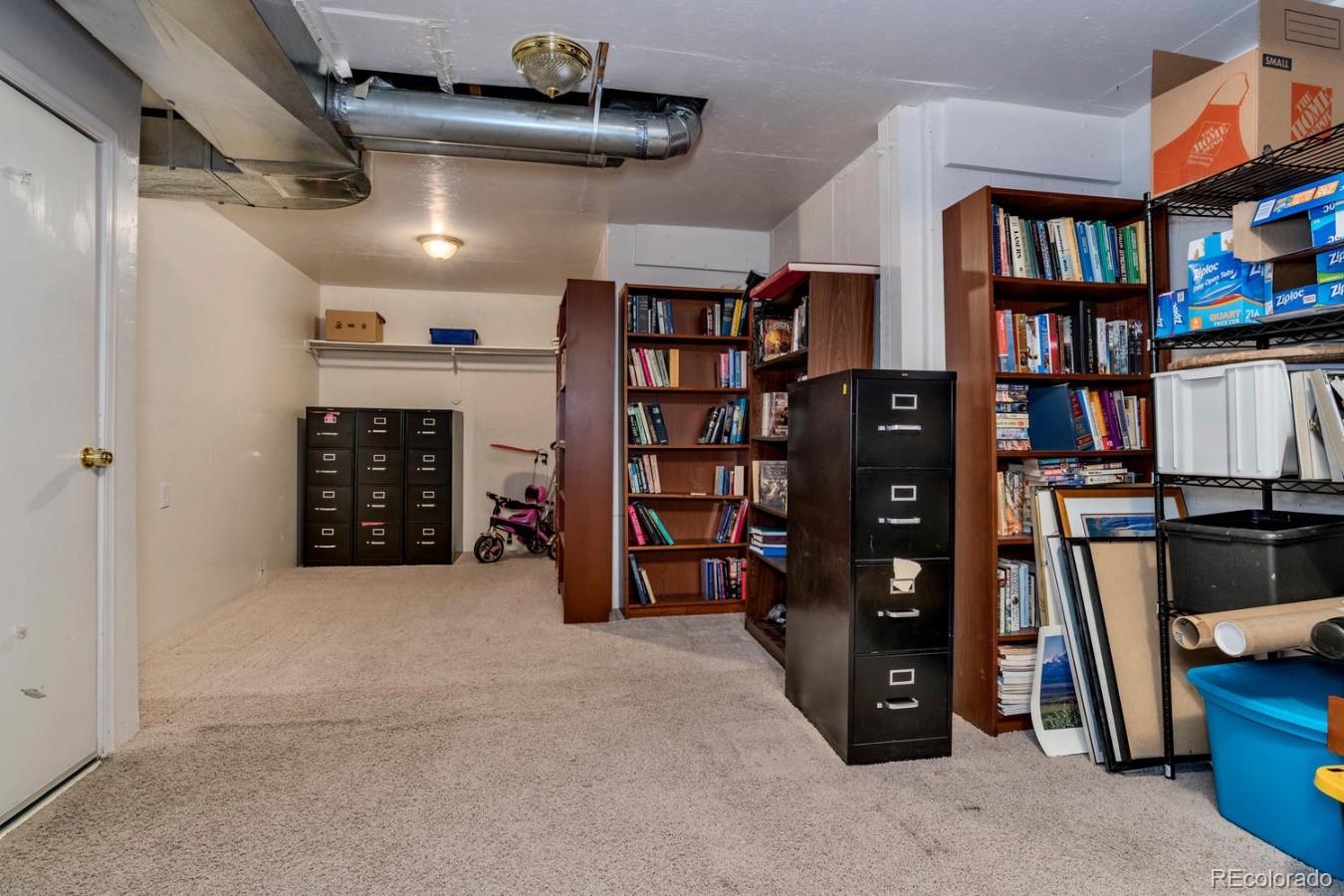 6486 Silver Mesa Drive, Unit B Highlands Ranch, CO 80130 - Photo 21 of 29 a view of room with closet and racks