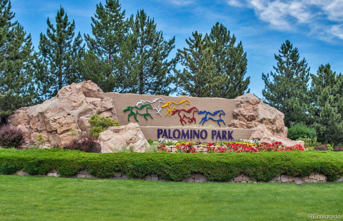 6486 Silver Mesa Drive, Unit B Highlands Ranch, CO 80130 - Photo 29 of 29 a sign on the side of the road