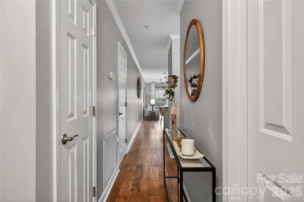 a kitchen with a sink cabinets and stainless steel appliances