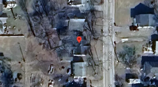 a bird view of house and car parked