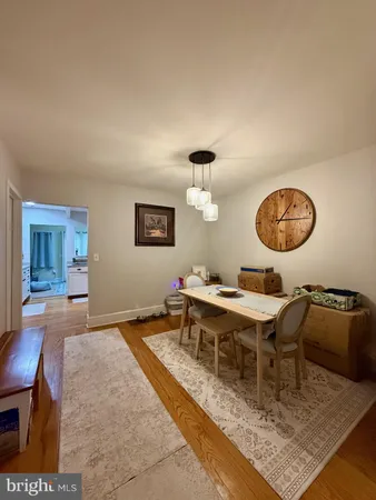 a living room with a couch and a table