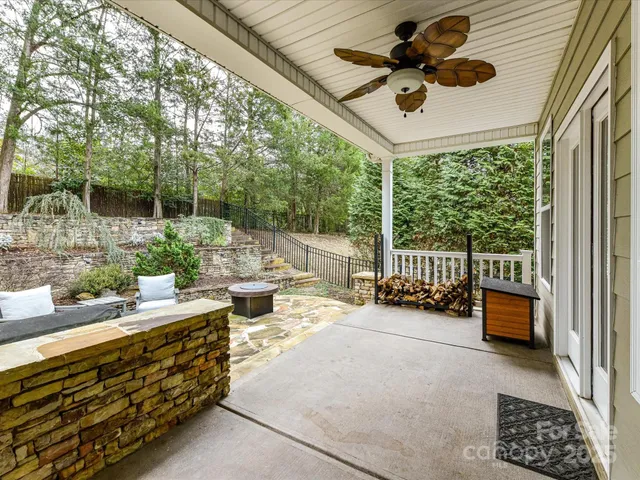 a view of a chairs and tables in the balcony