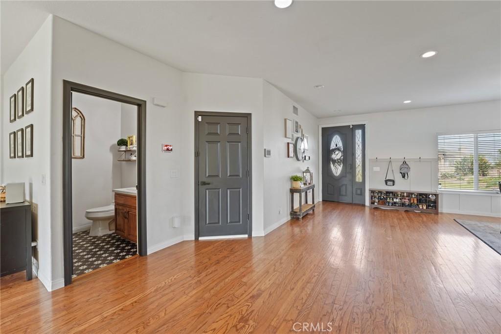 14289 Meadowlands Drive Riverside, CA 92503 - Photo 14 of 62 Half Bath, Garage and Entrance