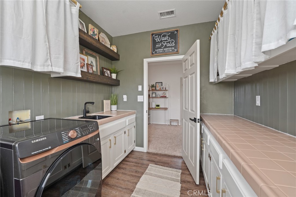 14289 Meadowlands Drive Riverside, CA 92503 - Photo 30 of 62 Laundry Room