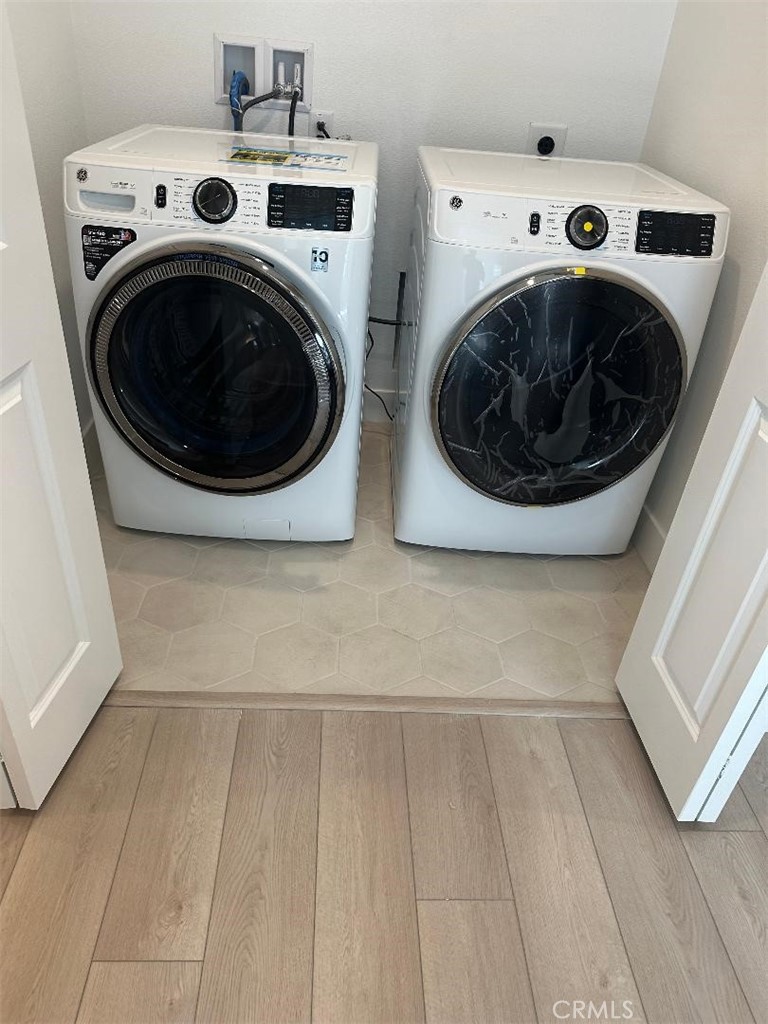 512 Nielson Irvine, CA 92618 - Photo 14 of 14 a utility room with dryer and washer