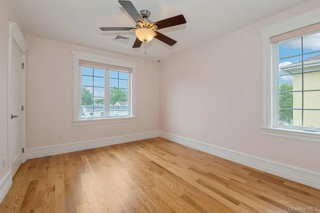 a white bath tub sitting next to a white toilet