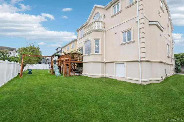 a view of balcony with furniture and wooden floor