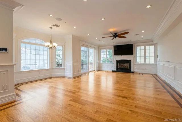 a kitchen with granite countertop a sink stove and cabinets