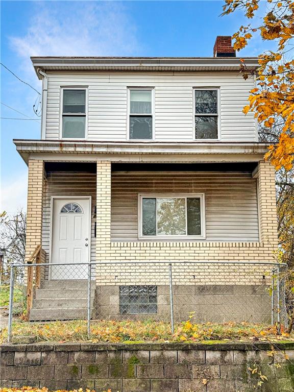 a view of a house with a swimming pool