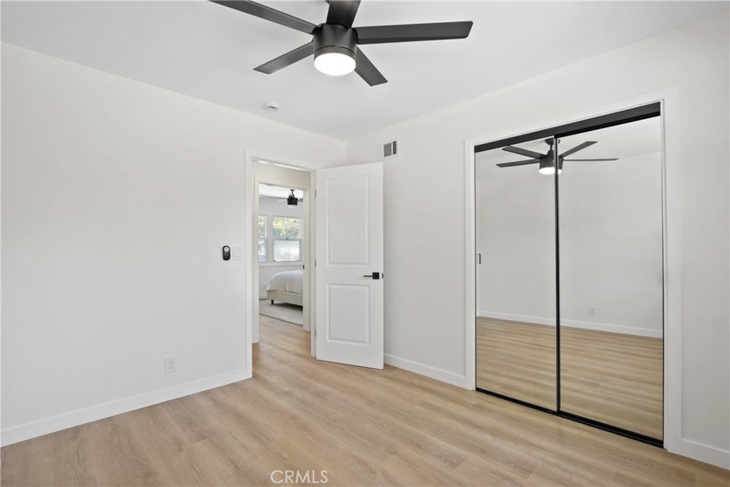12262 Morrie Lane Garden Grove, CA 92840 - Photo 14 of 16 wooden floor in an empty room