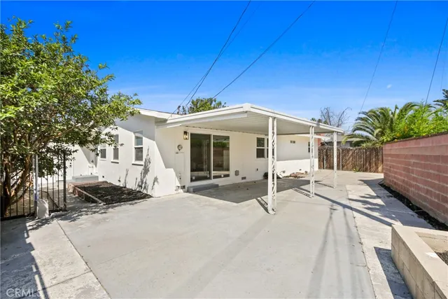 a view of a house with a patio