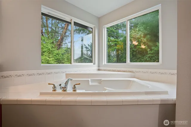 a sink sitting next to a window