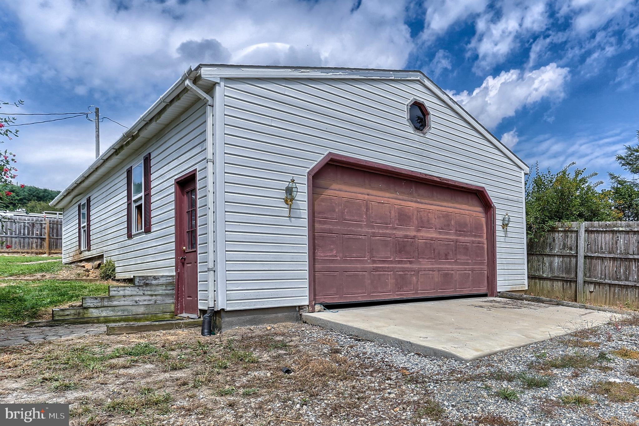9621 Orchard Road Spring Grove, PA 17362 - Photo 22 of 27 a front view of a house with a garage