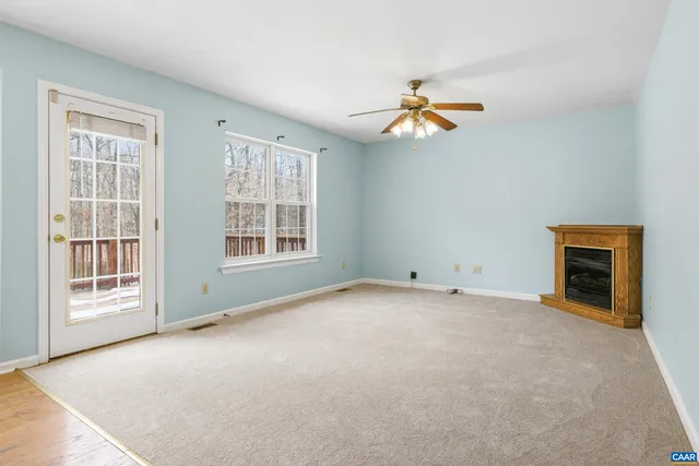 a view of a storage and utility room with washer and dryer