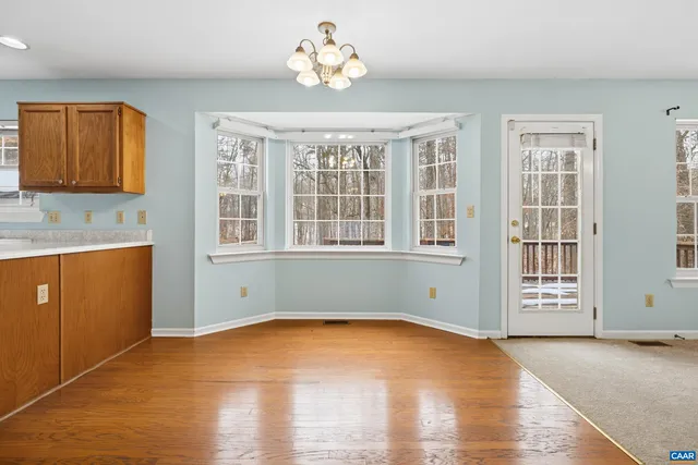 a bathroom with a sink a vanity and a mirror