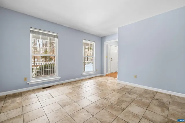 a kitchen with stainless steel appliances granite countertop a stove top oven a sink dishwasher and a microwave oven on the blue kitchen countertops
