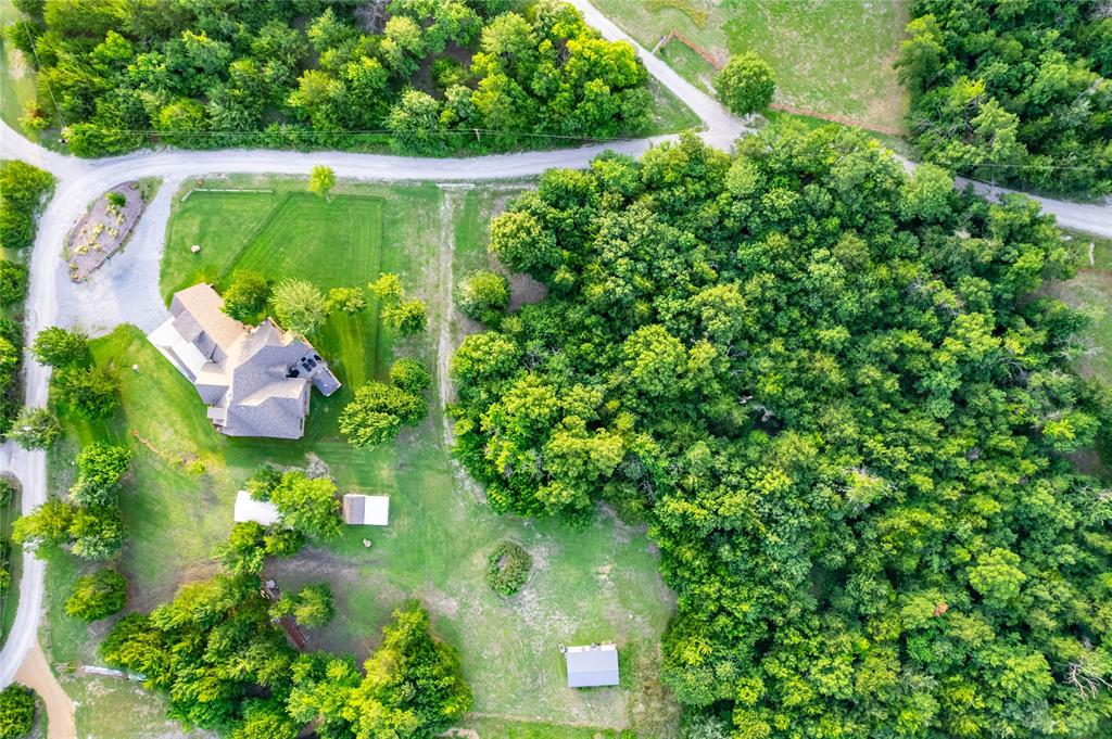 3300 Rigsby Lane Celina, TX 75009 - Photo 40 of 40 Aerial perspective highlighting a multi-story residence with a gabled roof