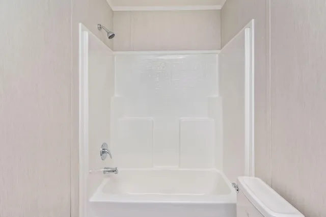 a close view of a bathtub in bathroom