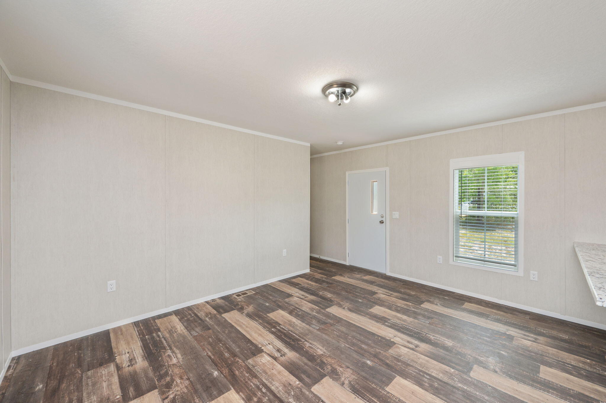 126 Pansy Lane DeFuniak Springs, FL 32433 - Photo 8 of 32 an empty room with windows