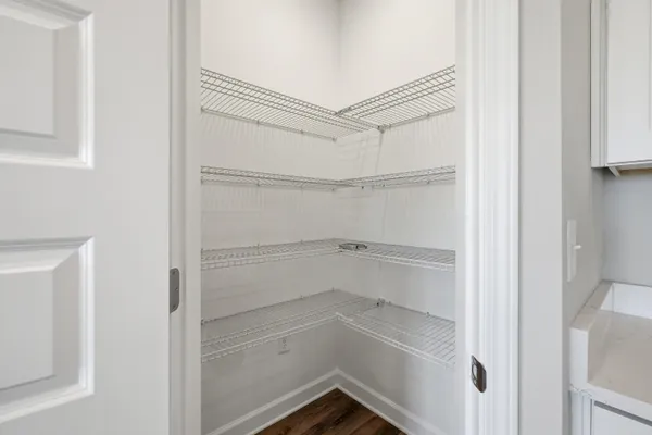 a view of an empty walk in closet