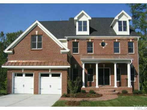 a view of a house with entrance gate