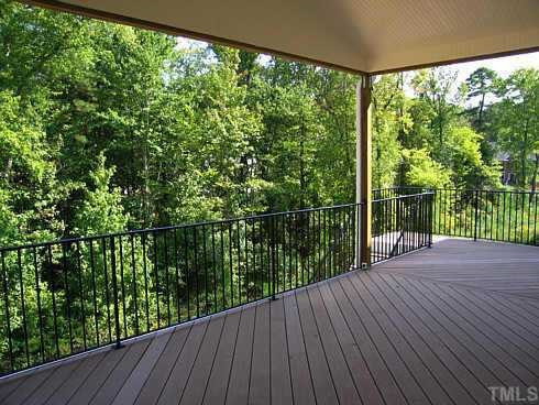 7409 Chesley Lane Durham, NC 27713 - Photo 10 of 10 a view of a balcony with wooden floor