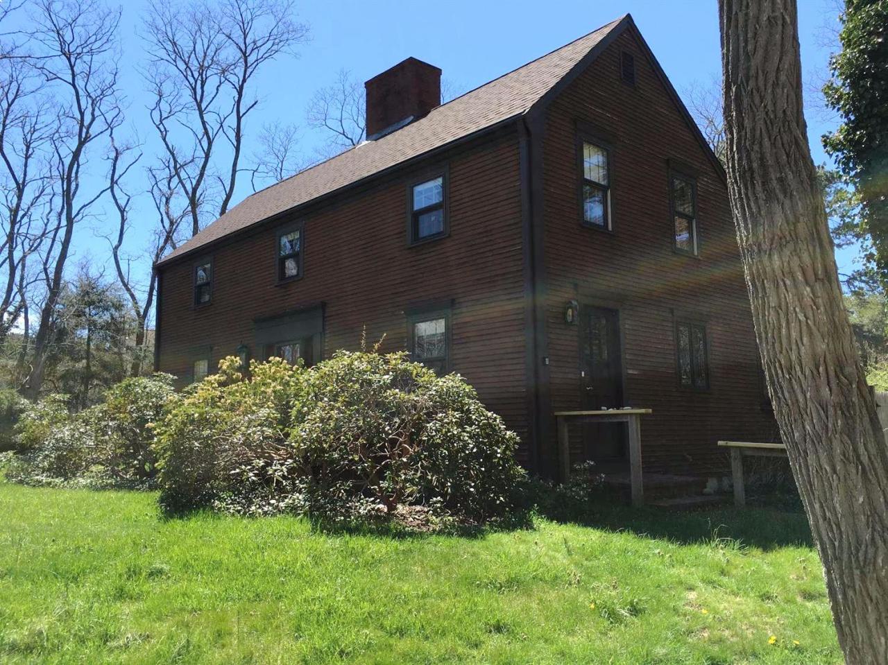 35 Split Rail Road Eastham, MA 02642 - Photo 1 of 28 a front view of a house with garden