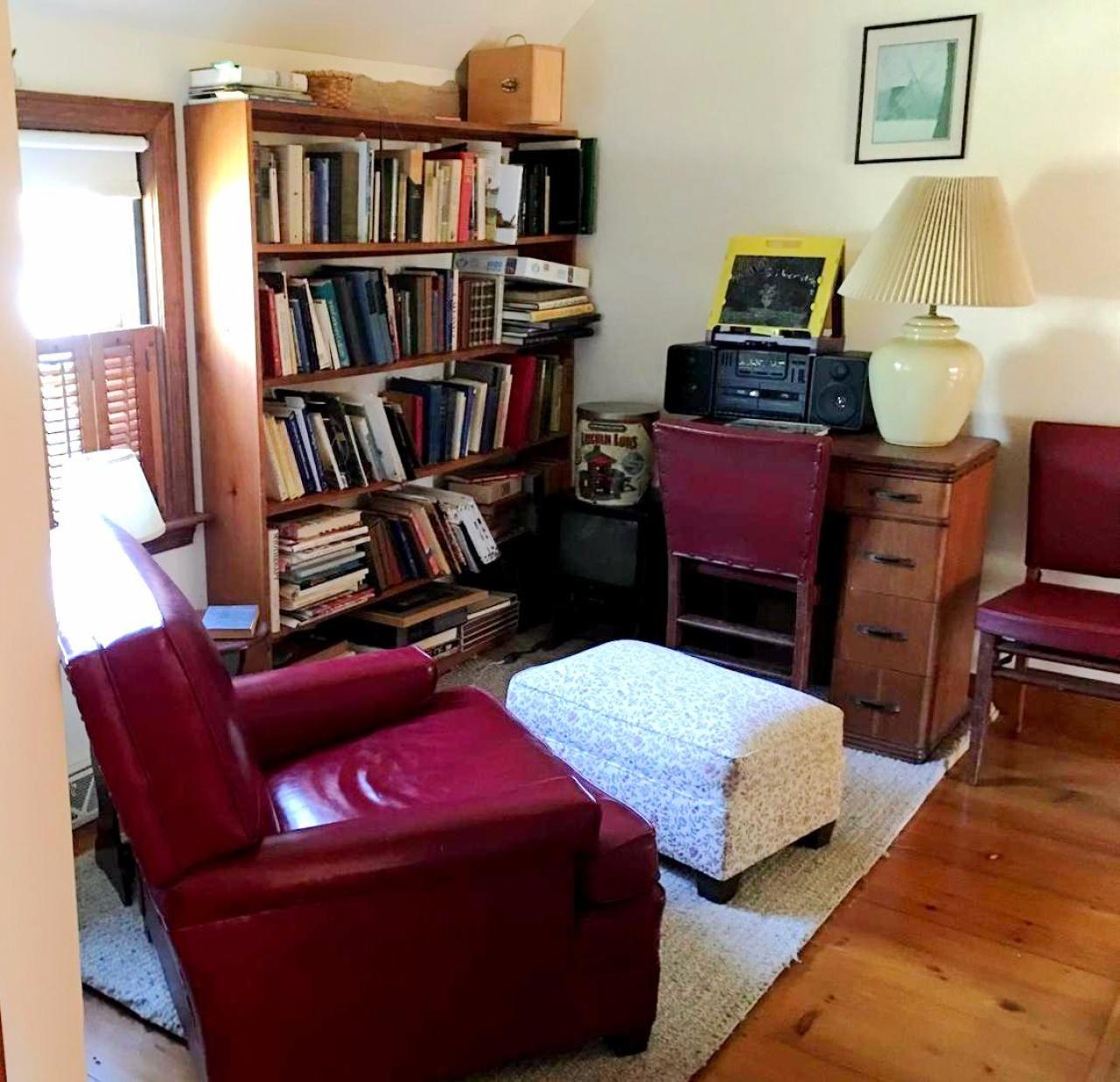 35 Split Rail Road Eastham, MA 02642 - Photo 19 of 28 a bedroom with furniture and a book shelf