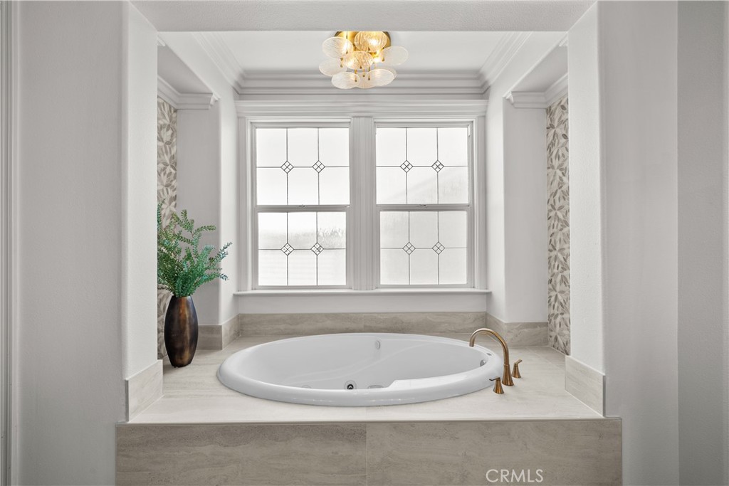 19628 Mathilde Lane Saugus, CA 91350 - Photo 38 of 59 a bathroom with a tub and window