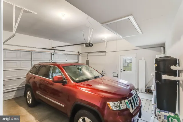 a view of cars parked in garage