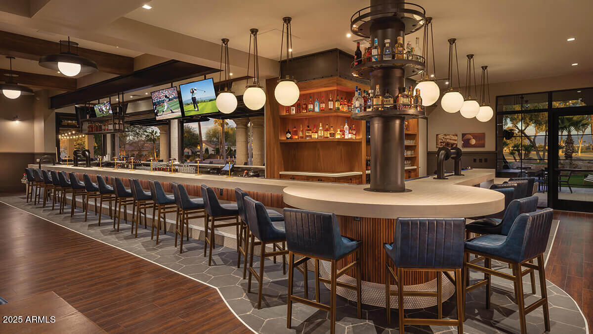 2029 North 164th Avenue Goodyear, AZ 85395 - Photo 17 of 17 a large kitchen with a table and chairs